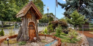 Tree house and plants outside of Timberline Post Acute
